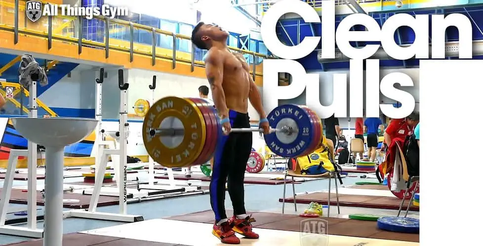 A man performing the clean pull CrossFit Exercise https://get-strong.fit/Fitness